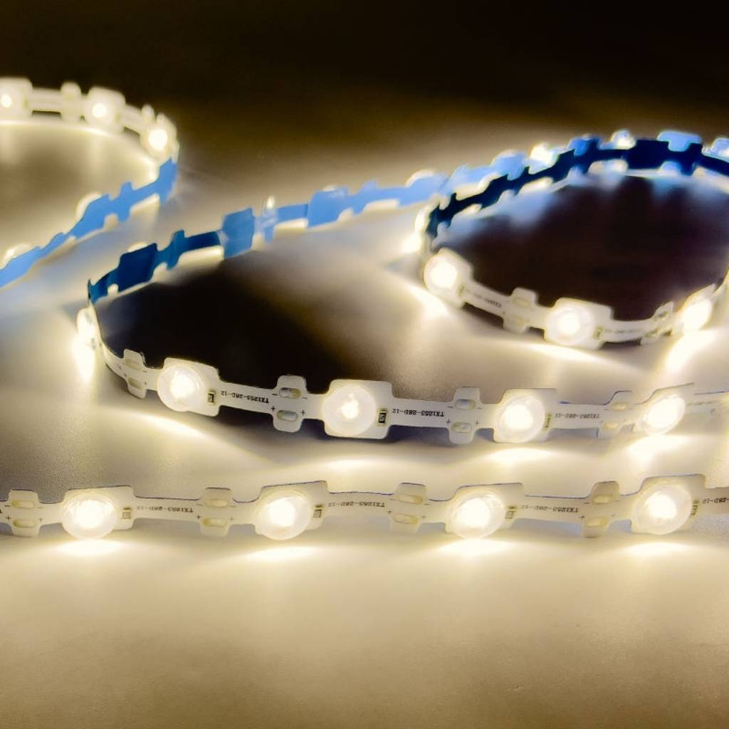 Tổng đại lý Led dây dán ziczac 12V 3030 thấu kính tỏa trắng ấm ngoài trời